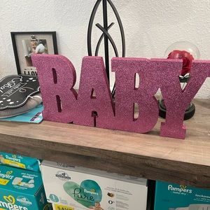 Baby table decor in pink glitter